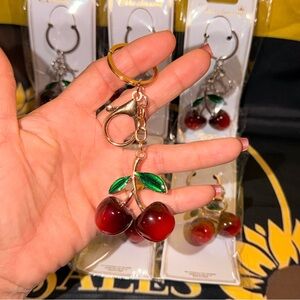 Cherry Keychain with Gold and Green Accents